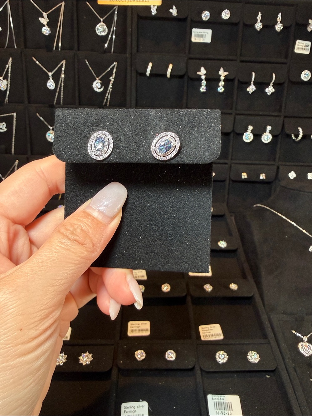 Sterling Silver Oval Blue Halo Stud Earrings
